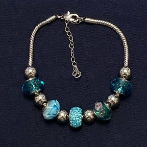 Silvertone Teal Mix Glass Beads Bracelet.
